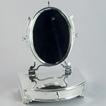 An Edward VII novelty jewellery box in the form of a toilet mirror